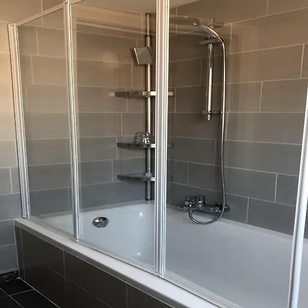 Bright Family With Bikes De Panne